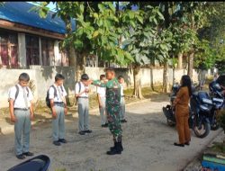 Babinsa Berikan Pembinaan Disiplin dan Karakter di SMKN 1 Balige 