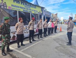 Babinsa Perkuat Pengamanan Arus Mudik Lebaran di Pos Pam Laguboti