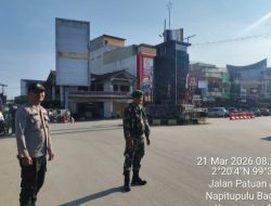 Babinsa Koramil 17/Balige Tetap Siaga Jaga Pos Pengamanan Pos Terpadu Lebaran Idul Fitri 1447 H/2026