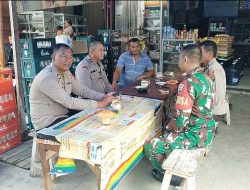 Babinsa Jalin Sinergitas dengan Personel Polsek Laguboti 