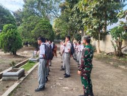 Babinsa Berikan Pengawasan dan Sosialisasi Masuk TNI AD Pada Siswa SMKN 1 Balige 