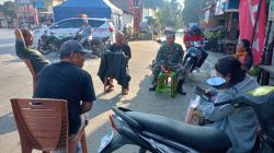 Babinsa Jalin Keakraban dengan Warga Desa Aruan