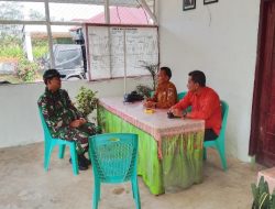 Danramil 16/Laguboti Komsos dengan Kepala Desa Sidulang 