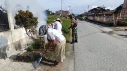 Babinsa dan Warga Gelar Gotong Royong Bersama di Desa Pardinggaran Laguboti 