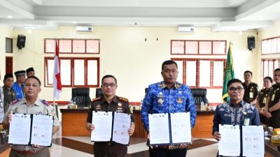 Bupati Toba Tandatangani Nota Kesepahaman dan Perjanjian Kerja Sama Percepatan Pendaftaran Tanah Wakaf