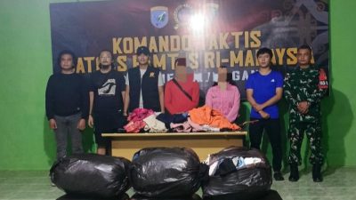 Satgas Pamtas RI-Malaysia Yonarmed 19/Bogani Gagalkan Penyelundupan 7 Koli Ball Press Illegal di Jalur Tikus Entikong